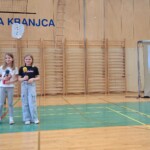 Kulturni praznik 2025 in Otroci pojejo slovenske pesmi in se veselijo