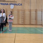 Kulturni praznik 2025 in Otroci pojejo slovenske pesmi in se veselijo